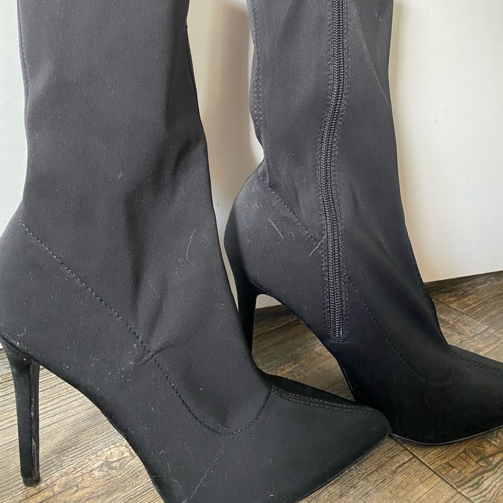 Black calf length heeled boots